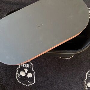 Dyson Black and Copper Oval Case